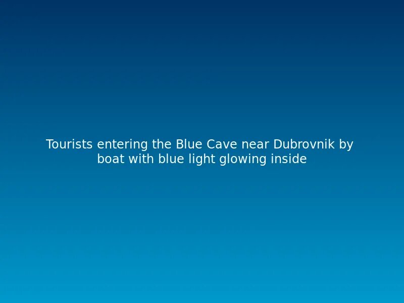 Tourists entering the Blue Cave near Dubrovnik by boat with blue light glowing inside